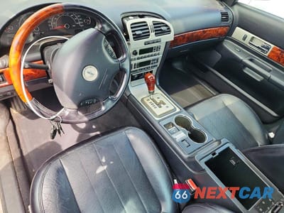 Zdjęcie 10 z 14 samochodu: 2003 LINCOLN LS VIN:1LNHM87AX3Y694055 - miniatura