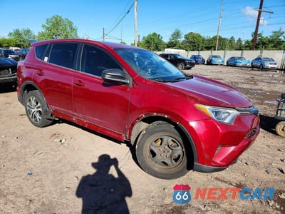 Czwarte zdjęcie samochodu z boku: 2018 TOYOTA RAV4 LE VIN:2T3BFREV6JW742237 - miniatura