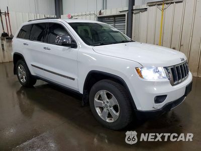 Czwarte zdjęcie samochodu z boku: 2013 JEEP GRAND CHEROKEE LIMITED VIN:1C4RJFBG3DC580530 - miniatura