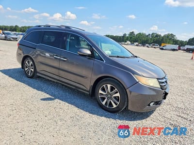 Czwarte zdjęcie samochodu z boku: 2016 HONDA ODYSSEY TOURING VIN:5FNRL5H91GB026150 - miniatura
