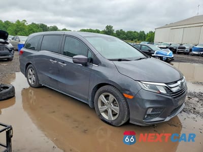 Czwarte zdjęcie samochodu z boku: 2019 HONDA ODYSSEY EXL VIN:5FNRL6H73KB124755 - miniatura
