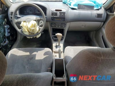 Zdjęcie 8 z 12 samochodu: 2001 TOYOTA COROLLA LE VIN:1NXBR12E21Z484577 - miniatura