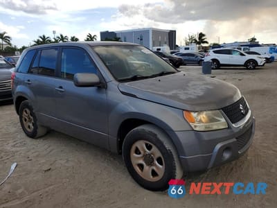 Czwarte zdjęcie samochodu z boku: 2010 SUZUKI GRAND VITARA PREMIUM VIN:JS3TE0D2XA4100337 - miniatura