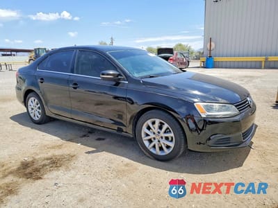 Czwarte zdjęcie samochodu z boku: 2014 VOLKSWAGEN JETTA VIN:3VWD17AJ6EM333013 - miniatura