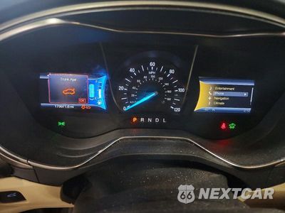 Zdjęcie 9 z 13 samochodu: 2013 FORD FUSION SE PHEV VIN:3FA6P0PU4DR302756 - miniatura