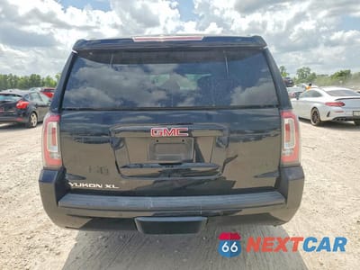 Zdjęcie 6 z 14 samochodu: 2020 GMC YUKON XL C1500 SLT VIN:1GKS1GKC2LR189373 - miniatura