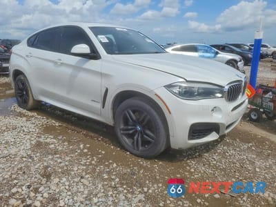 Czwarte zdjęcie samochodu z boku: 2016 BMW X6 XDRIVE50I VIN:5UXKU6C53G0S82442 - miniatura