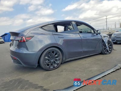 Trzecie zdjęcie samochodu z tyłu: 2022 TESLA MODEL Y VIN:7SAYGDEE7NF369878 - miniatura