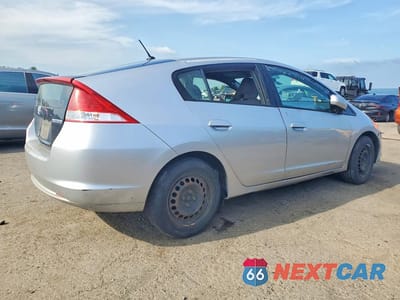 Trzecie zdjęcie samochodu z tyłu: 2010 HONDA INSIGHT LX VIN:JHMZE2H56AS027910 - miniatura