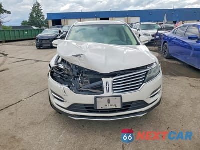 Piąte zdjęcie samochodu w środku: 2015 LINCOLN MKC VIN:5LMCJ2A94FUJ36421 - miniatura