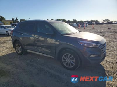 Czwarte zdjęcie samochodu z boku: 2017 HYUNDAI TUCSON SE VIN:KM8J33A46HU527961 - miniatura