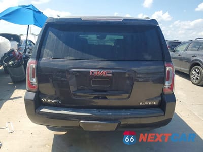 Zdjęcie 6 z 13 samochodu: 2015 GMC YUKON SLT VIN:1GKS1BKC9FR307717 - miniatura