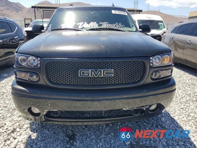 Piąte zdjęcie samochodu w środku: 2004 GMC YUKON DENALI VIN:1GKEK63U54J317343 - miniatura