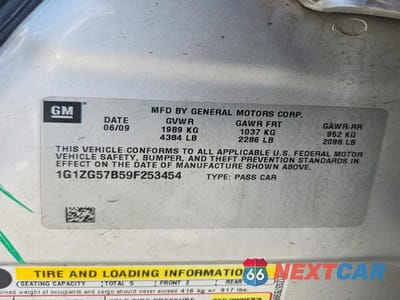 Zdjęcie 12 z 12 samochodu: 2009 CHEVROLET MALIBU LS VIN:1G1ZG57B59F253454 - miniatura