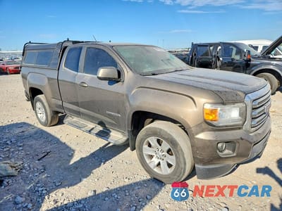 Czwarte zdjęcie samochodu z boku: 2015 GMC CANYON SLE VIN:1GTH5BEA0F1161260 - miniatura