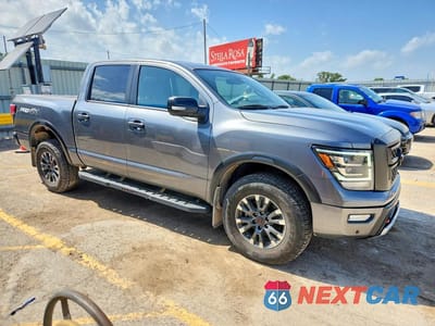 Czwarte zdjęcie samochodu z boku: 2024 NISSAN TITAN PRO-4X VIN:1N6AA1ED6RN113774 - miniatura