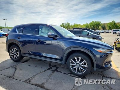 Czwarte zdjęcie samochodu z boku: 2017 MAZDA CX-5 GRAND TOURING VIN:JM3KFADL4H0154859 - miniatura