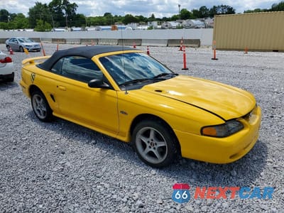 Czwarte zdjęcie samochodu z boku: 1998 FORD MUSTANG GT VIN:1FAFP45X5WF195544 - miniatura