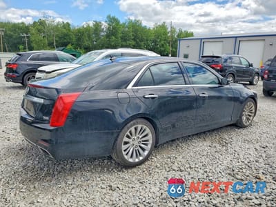 Trzecie zdjęcie samochodu z tyłu: 2014 CADILLAC CTS LUXURY COLLECTION VIN:1G6AX5S38E0194145 - miniatura