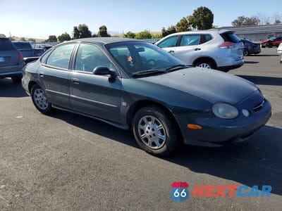Czwarte zdjęcie samochodu z boku: 1998 FORD TAURUS LX VIN:1FAFP52SXWG161611 - miniatura