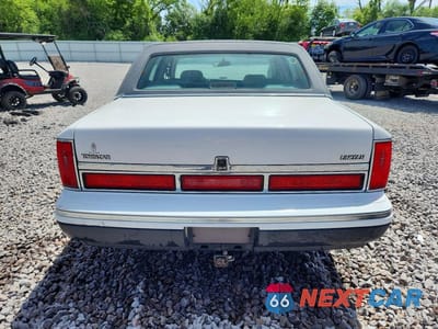 Zdjęcie 6 z 13 samochodu: 1997 LINCOLN TOWN CAR SIGNATURE VIN:1LNLM82W1VY742557 - miniatura