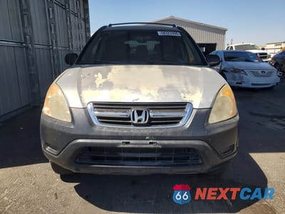 Piąte zdjęcie samochodu w środku: 2003 HONDA CR-V LX VIN:JHLRD68433C005639 - miniatura