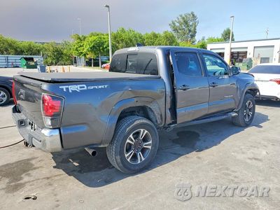 Trzecie zdjęcie samochodu z tyłu: 2018 TOYOTA TACOMA TRD SPORT VIN:5TFAZ5CN9JX071401 - miniatura