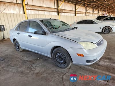 Czwarte zdjęcie samochodu z boku: 2006 FORD FOCUS ZX4 VIN:1FAFP34N76W120189 - miniatura