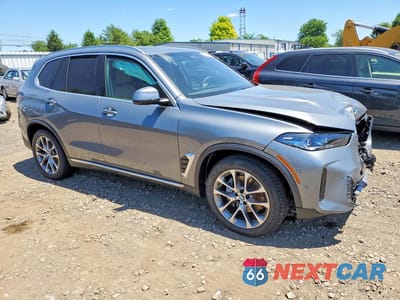 Czwarte zdjęcie samochodu z boku: 2026 BMW X5 XDRIVE40I VIN:5UX23EU05T9319383 - miniatura