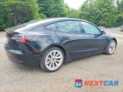 Trzecie zdjęcie samochodu z tyłu: 2023 TESLA MODEL 3 VIN:5YJ3E1EA1PF428466 - miniatura