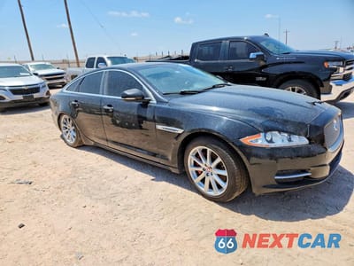 Czwarte zdjęcie samochodu z boku: 2015 JAGUAR XJ VIN:SAJWJ1CDXF8V79327 - miniatura