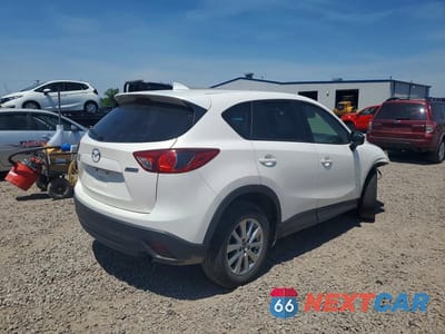 Trzecie zdjęcie samochodu z tyłu: 2016 MAZDA CX-5 TOURING VIN:JM3KE4CY2G0728293 - miniatura