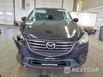 Piąte zdjęcie samochodu w środku: 2016 MAZDA CX-5 SPORT VIN:JM3KE4BY0G0881823 - miniatura