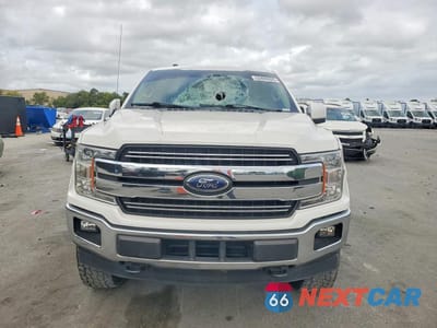 Piąte zdjęcie samochodu w środku: 2018 FORD F150 SUPERCREW VIN:1FTFW1E16JFD49002 - miniatura