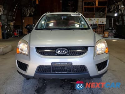 Piąte zdjęcie samochodu w środku: 2010 KIA SPORTAGE LX VIN:KNDKGCA33A7706757 - miniatura