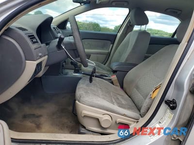Zdjęcie 7 z 12 samochodu: 2011 FORD FUSION S VIN:3FAHP0GAXBR206822 - miniatura