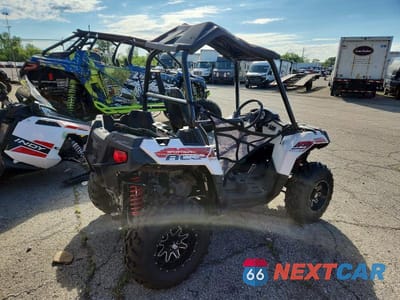 Czwarte zdjęcie samochodu z boku: 2014 POLARIS SPORTSMAN VIN:4XABH33AHEA597576 - miniatura