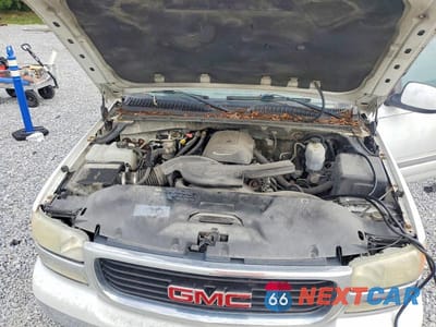 Zdjęcie 12 z 13 samochodu: 2004 GMC YUKON VIN:1GKEC13Z14R245781 - miniatura