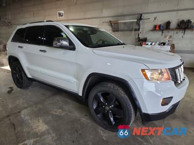 Czwarte zdjęcie samochodu z boku: 2013 JEEP GRAND CHEROKEE OVERLAND VIN:1C4RJFCG5DC609542 - miniatura