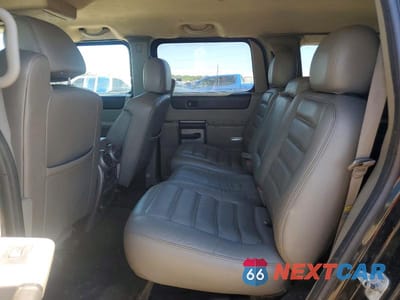 Zdjęcie 11 z 13 samochodu: 2004 HUMMER H2 VIN:5GRGN23UX4H103393 - miniatura