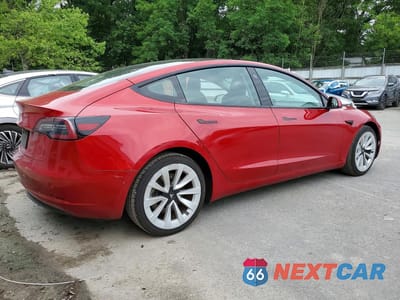 Trzecie zdjęcie samochodu z tyłu: 2022 TESLA MODEL 3 VIN:5YJ3E1EA7NF369470 - miniatura
