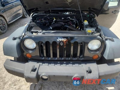 Zdjęcie 12 z 13 samochodu: 2010 JEEP WRANGLER UNLIMITED RUBICON VIN:1J4HA6H12AL187929 - miniatura