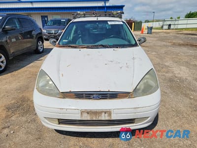 Piąte zdjęcie samochodu w środku: 2003 FORD FOCUS ZX5 VIN:3FAHP37323R133658 - miniatura