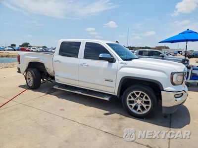 Czwarte zdjęcie samochodu z boku: 2018 GMC SIERRA K1500 SLT VIN:3GTU2NEJ0JG454675 - miniatura