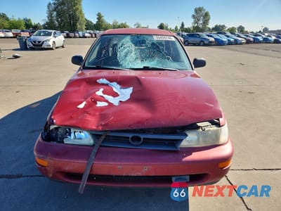 Piąte zdjęcie samochodu w środku: 1993 TOYOTA COROLLA DELUXE VIN:1NXAE09EXPZ104305 - miniatura