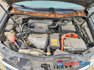Zdjęcie 11 z 12 samochodu: 2012 TOYOTA CAMRY HYBRID XLE VIN:4T1BD1FK7CU034120 - miniatura