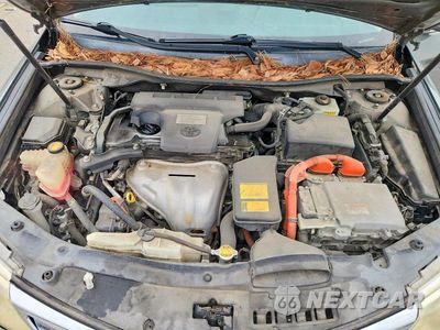 Zdjęcie 11 z 12 samochodu: 2012 TOYOTA CAMRY HYBRID XLE VIN:4T1BD1FK7CU034120 - miniatura