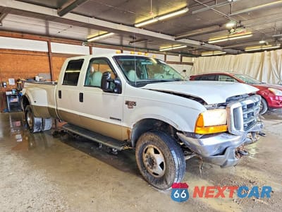 Czwarte zdjęcie samochodu z boku: 2000 FORD F350 SUPER DUTY VIN:1FTWW33F6YEE04400 - miniatura