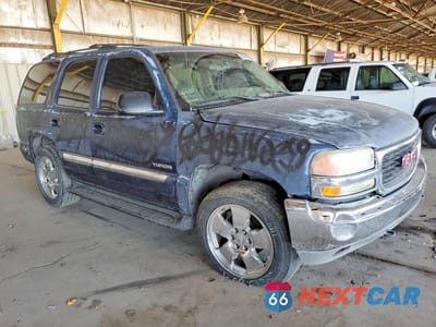 Czwarte zdjęcie samochodu z boku: 2002 GMC YUKON VIN:1GKEC13VX2J285804 - miniatura