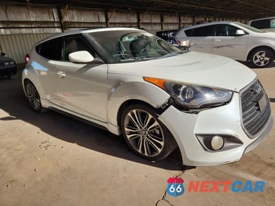 Czwarte zdjęcie samochodu z boku: 2017 HYUNDAI VELOSTER TURBO VIN:KMHTC6AE8HU310320 - miniatura